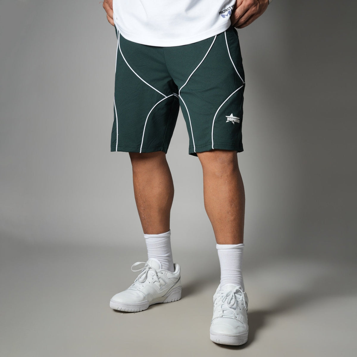 DARK GREEN VELOCITY CURVE SHORTS